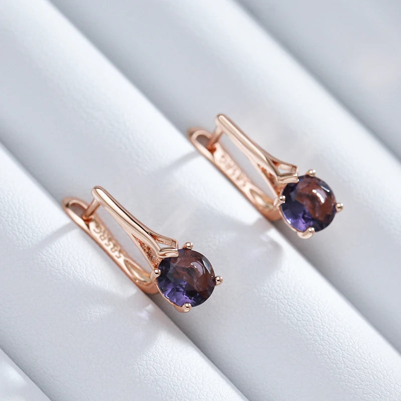 Boucles d'oreilles Zircons mauves, bijou en alliage plaqué or rose 585 (14 carats) et en zircons naturels