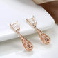 Boucles d'oreilles gouttes et arabesques ajourées, bijou en plaqué or rose 585 (14 carats)