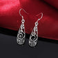 Boucles d'oreilles arabesques ajourées, bijou en plaqué argent