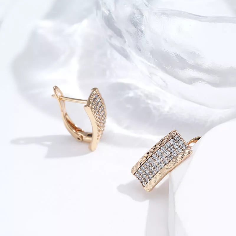 Boucles d'oreilles pavés de zircons, bijou en plaqué or rose et en zircons naturels