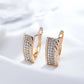 Boucles d'oreilles pavés de zircons, bijou en plaqué or rose et en zircons naturels