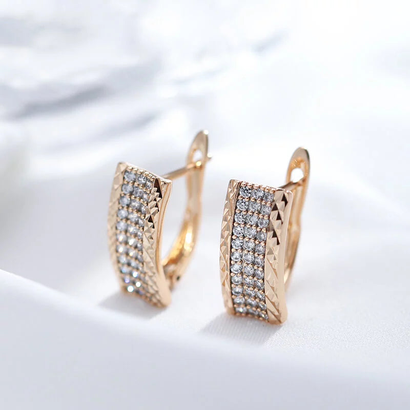 Boucles d'oreilles pavés de zircons, bijou en plaqué or rose et en zircons naturels