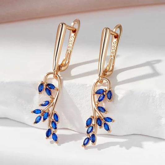 Boucles d'oreilles Fleurs bleues, bijou en plaqué or rose et en zircons naturels
