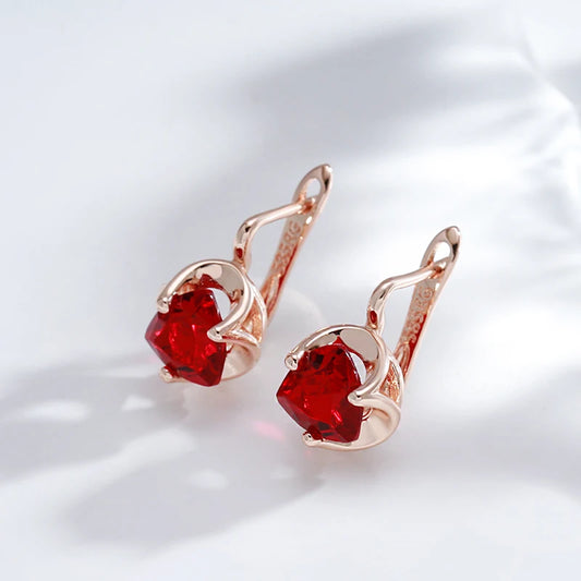 Boucles d'oreilles zircons facettés rouges, bijou en plaqué or rose 585 (14 carats) et en zircons naturels