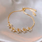 Bracelet Fleurs avec zircons blancs, bijou en plaqué or et en zircons naturels