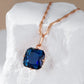 Collier pendentif pierre bleue, bijou en plaqué or rose 585 (14 carats) et en zircon naturel