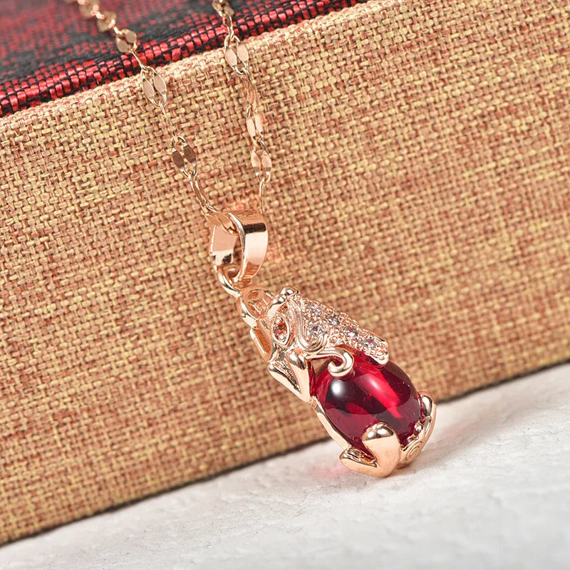 Collier éléphant avec pierre en agate rouge, bijou en acier inoxydable plaqué or rose