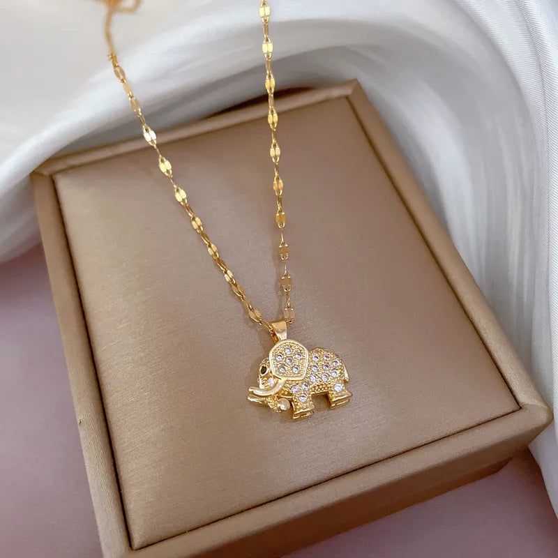 Collier Petit éléphant, bijou en acier inoxydable doré et zircons naturels