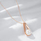 Collier pendentif perle nacrée, chaîne forçat, bijou en acrylique et en plaqué or rose