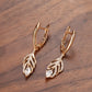 Boucles d'oreilles feuille en zircons blancs, bijou en plaqué or rose