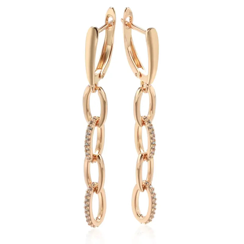 Boucles d'oreilles pendantes anneaux et zircons, bijou en plaqué or rose et en zircons naturels