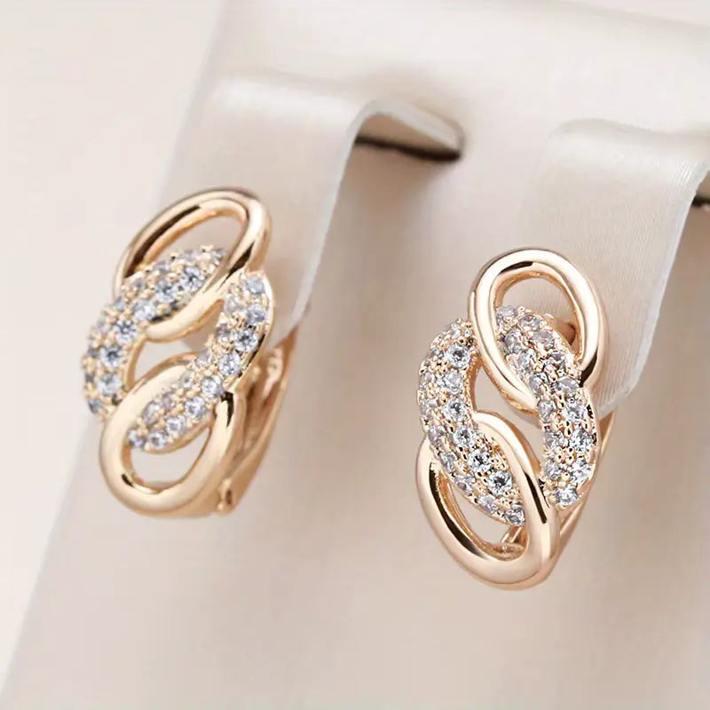 Boucles d'oreilles maillons et zircons, bijou en plaqué or rose et en zircons naturels
