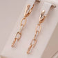 Boucles d'oreilles pendantes anneaux et zircons, bijou en plaqué or rose et en zircons naturels