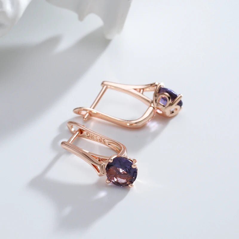 Boucles d'oreilles Zircons mauves, bijou en alliage plaqué or rose 585 (14 carats) et en zircons naturels