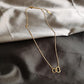 Collier coeurs enlacés, bijou en acier inoxydable doré