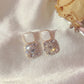 boucles d'oreilles carrées avec zircons blancs