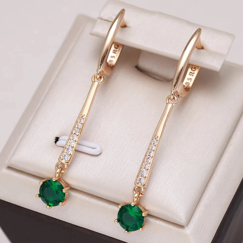 Boucles d'oreilles pendantes zircons verts, bijou en plaqué or rose 585 (14 carats) et en zircons naturels