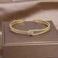Bracelet Noeud, bijou en alliage plaqué or et en zircons naturels