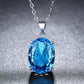 collier avec pendentif en cristal bleu