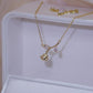 Collier Fleur rose et zircons, bijou en plaqué or rose et en zircons naturels